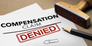 3d illustration of a worker compensation claim with a stamp denied. Disability insurance